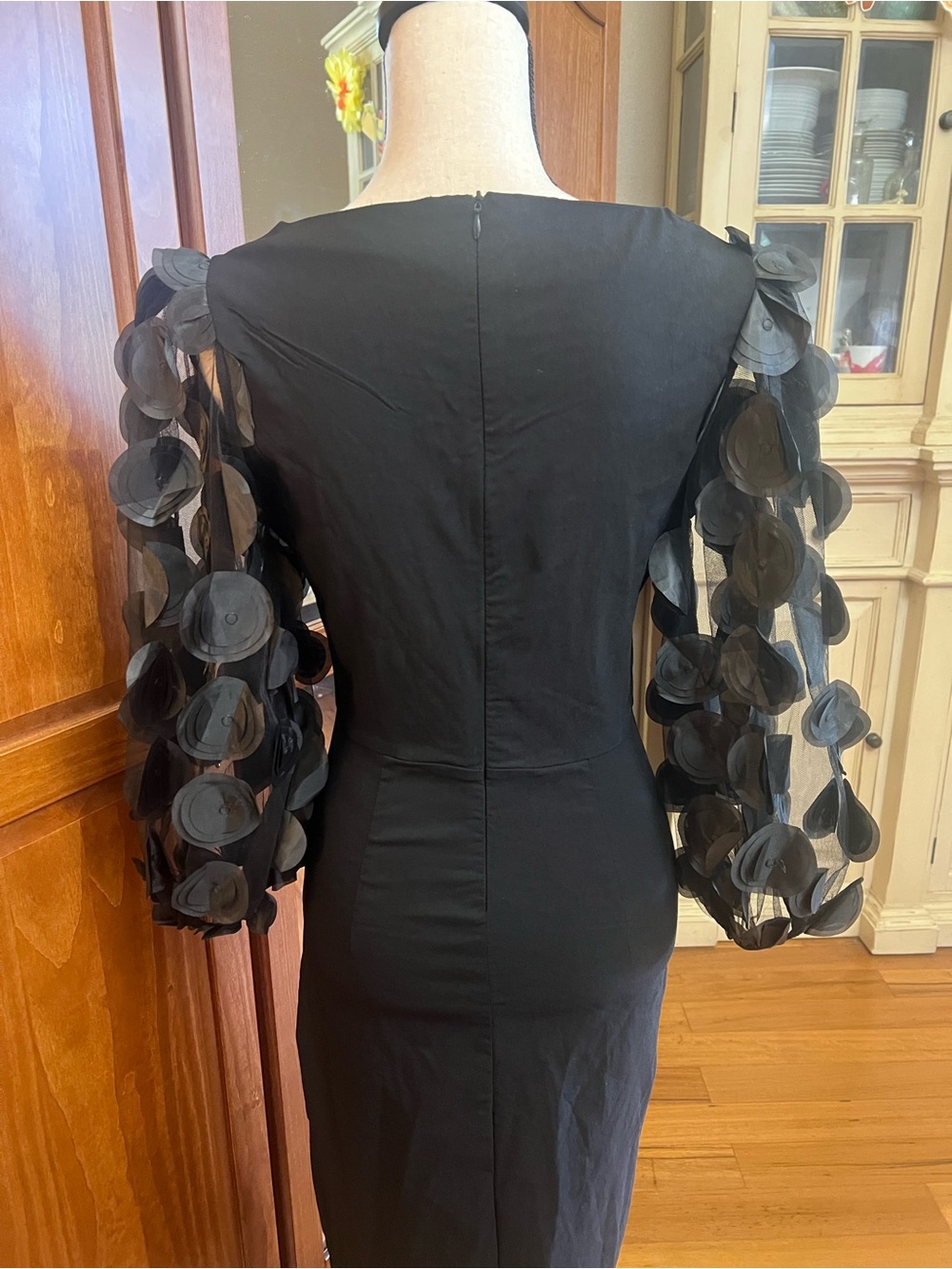 Elegant Black Midi Dress with Sheer Appliqué Sleeves - Picture 5 of 7
